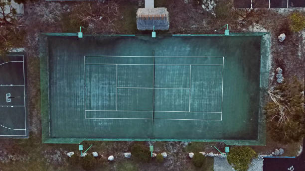 istock Rustic tennis court from above 950040940