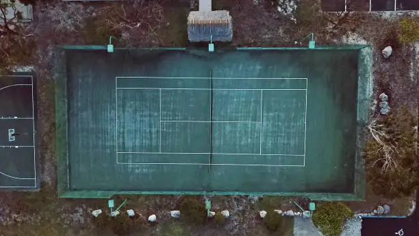 Aerial drone photo of a worn down tennis court in the Florida Keys