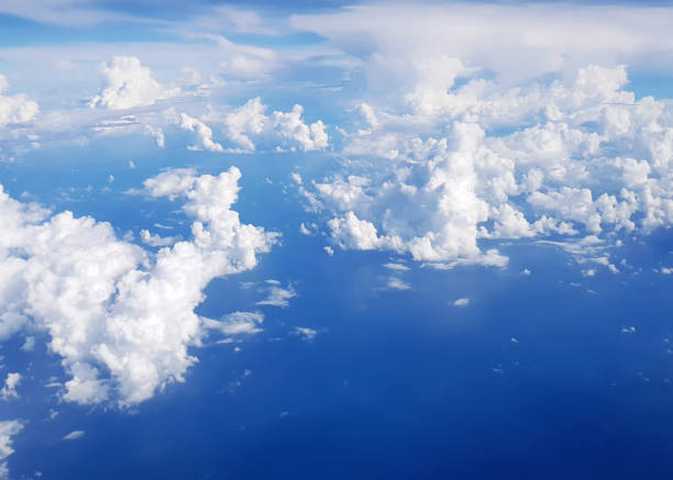 above the clouds in the sky. view from above the clouds. flying over clouds in plane. space boundless. weather and climate. big clouds. atmosphere and stratosphere. meteorology and aircraft. - cloud cloudscape stratosphere above imagens e fotografias de stock
