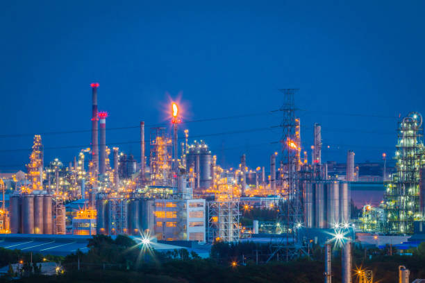 istock Petroleum refinery industry plant with lighting on twilight time 950049892