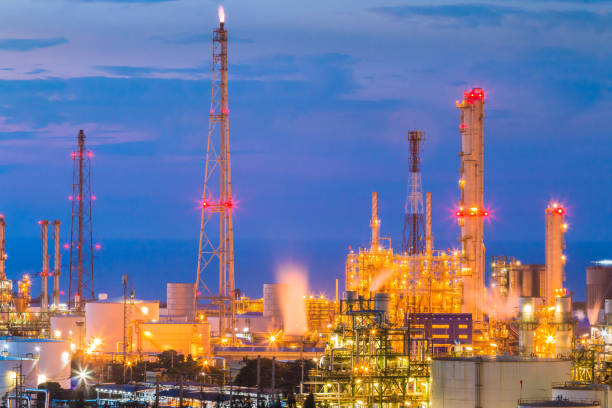 istock Petroleum refinery industry plant with lighting on twilight time 950049990