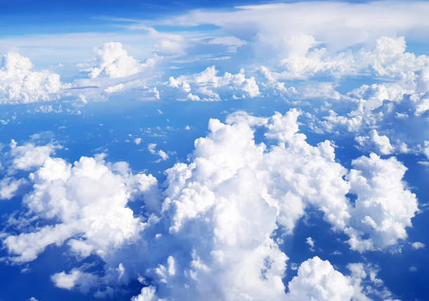 above the clouds in the sky. view from above the clouds. flying over clouds in plane. space boundless. weather and climate. big clouds. atmosphere and stratosphere. meteorology and aircraft. - cloud cloudscape stratosphere above imagens e fotografias de stock