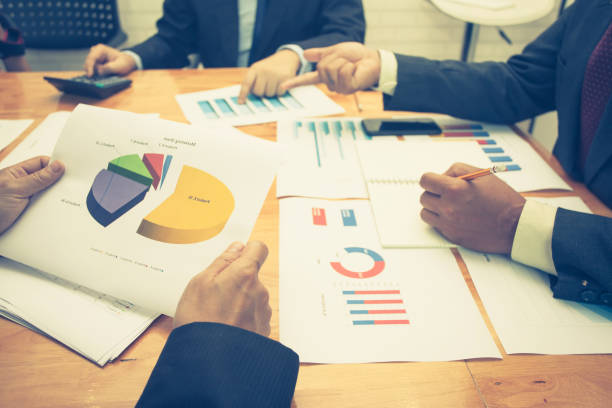 istock Teamwork process, business people working in the office discussing documents and ideas at meeting 950055742
