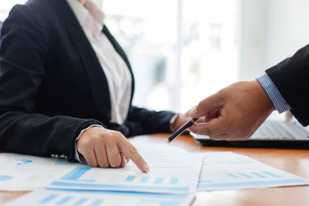 istock Teamwork process, business people working in the office discussing documents and ideas at meeting 950056682
