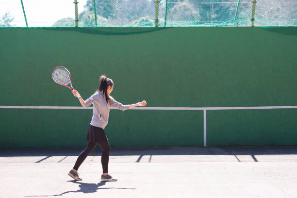 istock Japanese women playing tennis 950060392