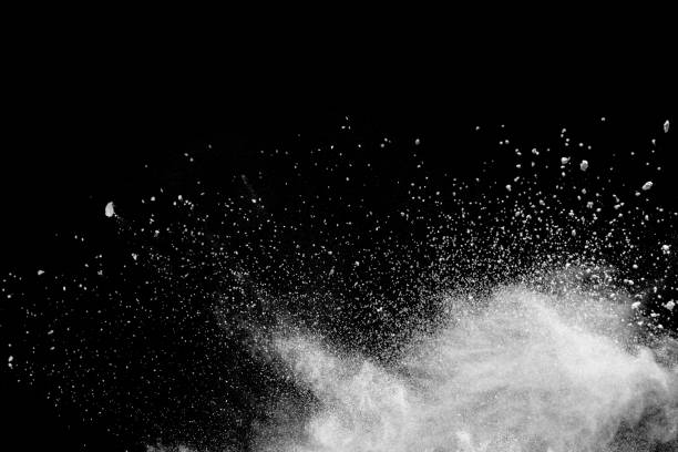 istock Launched white powder splash on black background. Bizarre forms of of white powder explosion cloud against dark background. 950060744