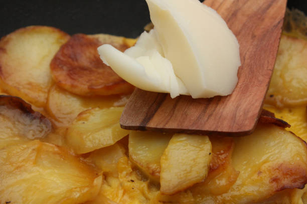 istock Potatoes cooked with goose fat for an omelette 950061614