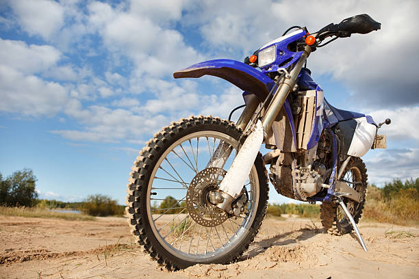 внедорожные motorbike - car stationary blue sky стоковые фото и изображения