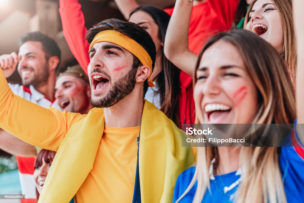One People Using Many Fans Fans At Stadium Together Stock Photo - Download Image Now - Crowd of ...