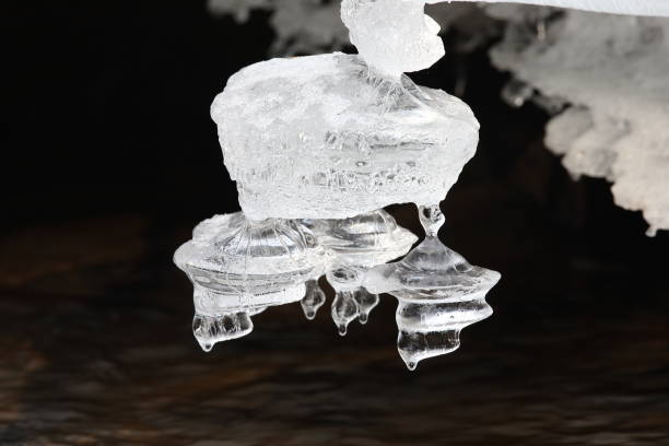 istock Frozen ice formations on a Winter stream, Saxony Germany 950080540