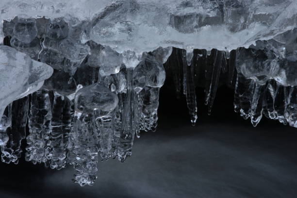 istock Frozen ice formations on a Winter stream, Saxony Germany 950084294