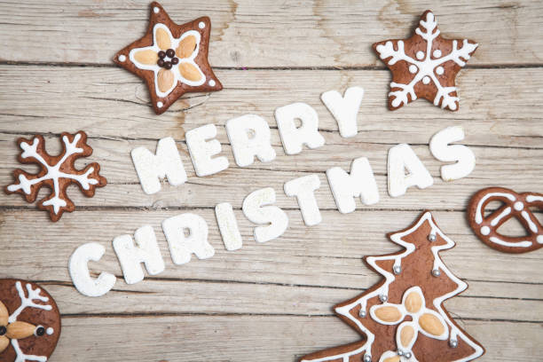 istock High Angle View Of Christmas Decorations And Cookies On Table 950085112