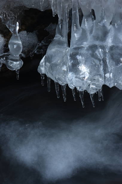 istock Frozen ice formations on a Winter stream, Saxony Germany 950085184