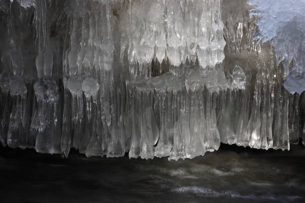 istock Frozen ice formations on a Winter stream, Saxony Germany 950085368