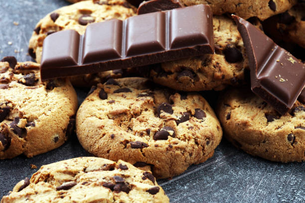 istock Chocolate cookies on rustic table. Chocolate chip cookies 950102978