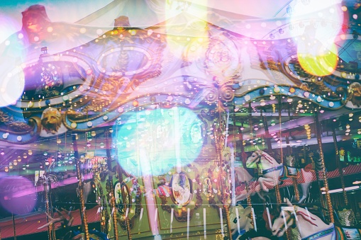 Abstract Double Exposure Carousel with Bokeh Background.