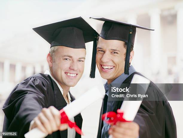 Graduates Holding Diplomas Stock Photo - Download Image Now - 20-24 Years, Achievement, Adult