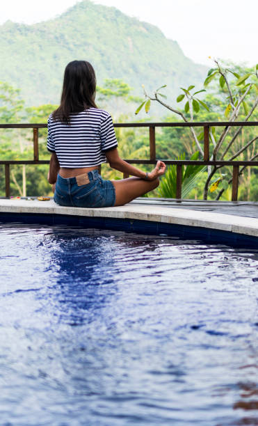 istock Woman doing yoga 950123064