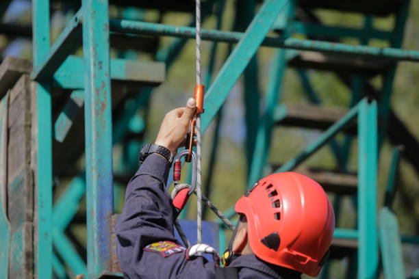 istock Firefighters are rappelling and climbing ropes at a drill exercise 950130122