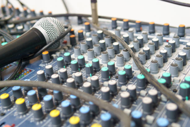 istock close up of button of sound mixed with blurred microphone. 950136010