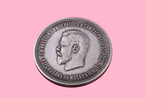 istock ruble coin isolated on pink background 950144544