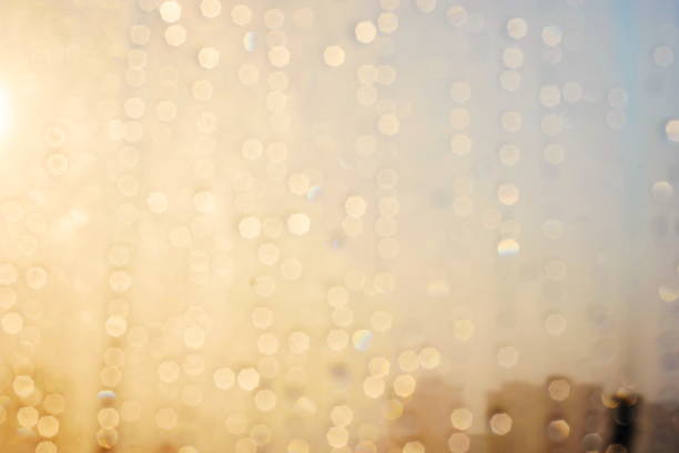 istock Rain drops and frozen water on window glass background 950148052