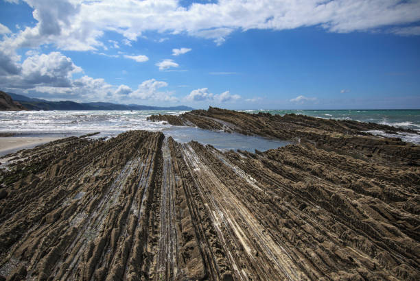 Beautiful, breathtaking and attractive rocks and water splash in ocean in Sandymouth area, Cornwall, UK. Suitable to use as wallpapers and backgrounds for nature lovers.