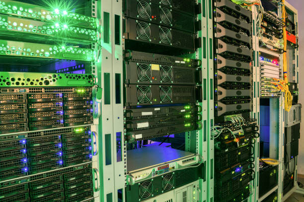 istock Many racks with servers located in the server room. Bright display a plurality of operating equipment 950160196