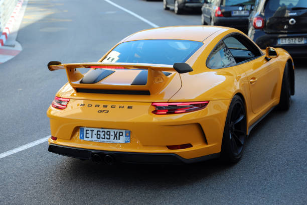 Monte-Carlo: Luxury Yellow Porsche 911 GT3 (Rear View) In The Street Of Monaco On The French Riviera