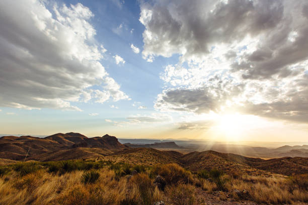 istock Sunset over the Chisos mountains with clouds and sky 950172750