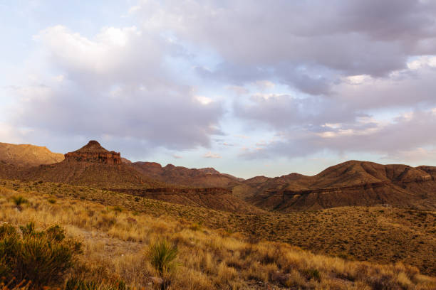 istock Sunset over the Chisos mountains with clouds and sky 950172764