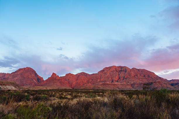 istock Dramatic sunset and sky over desert landscape 950172970
