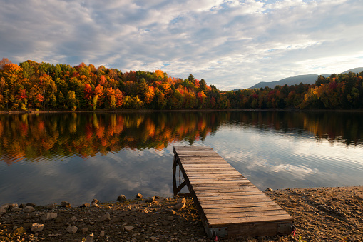 Fall colors at Waterbury Center State Park at sunrise in Vermont, USA