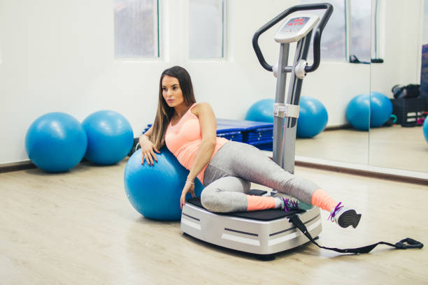 istock Young woman training in the gym 950178944