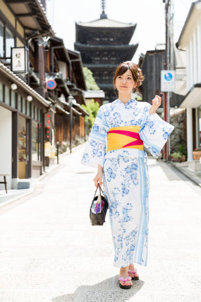 istock young asian woman wearing kimono in kyoto 950179310