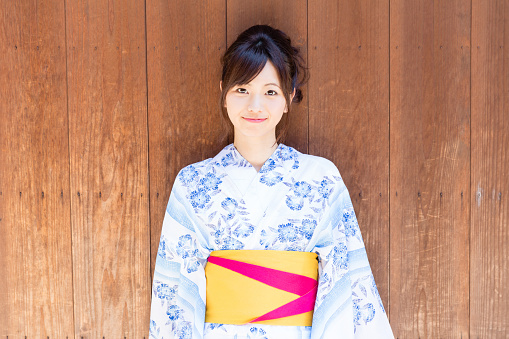 young asian woman wearing kimono in kyoto