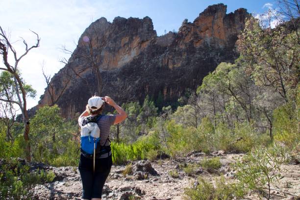 istock Bushwalking in the mountains and taking a photo 950182140