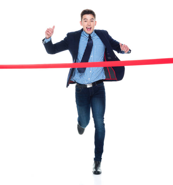 istock Businessman crossing the finish line 950182648