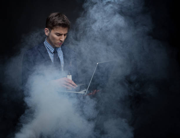 istock Well dressed businessman in fog, like cloud computing 950186084
