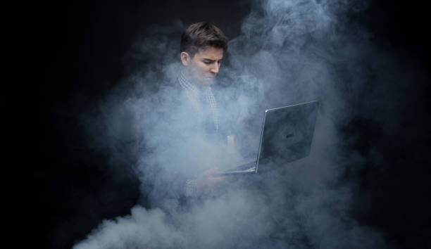 istock Well dressed businessman in fog, like cloud computing 950186156