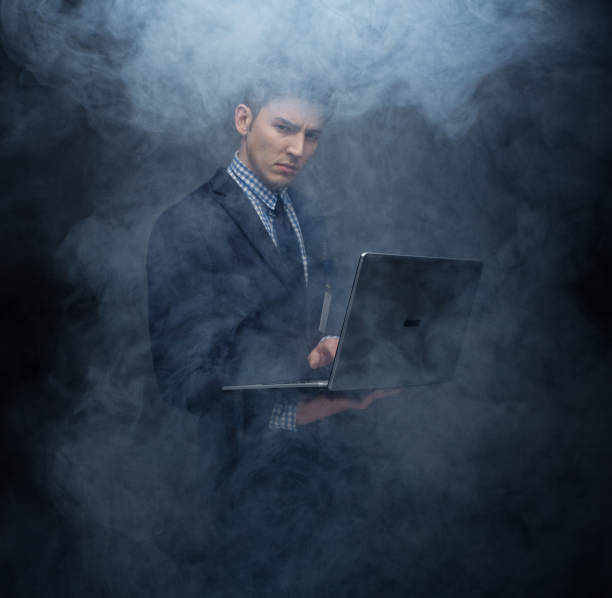istock Well dressed businessman in fog, like cloud computing 950186404