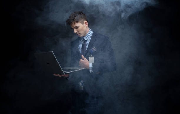 istock Well dressed businessman in fog, like cloud computing 950186574