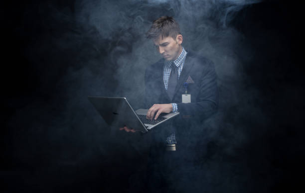 istock Well dressed businessman in fog, like cloud computing 950186668