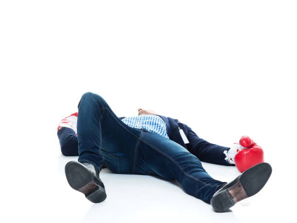 istock Handsome businessman knocked out 950186680