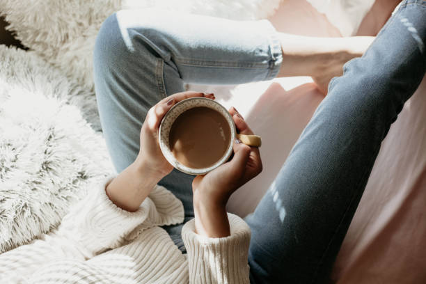Young millennial woman enjoying her coffee