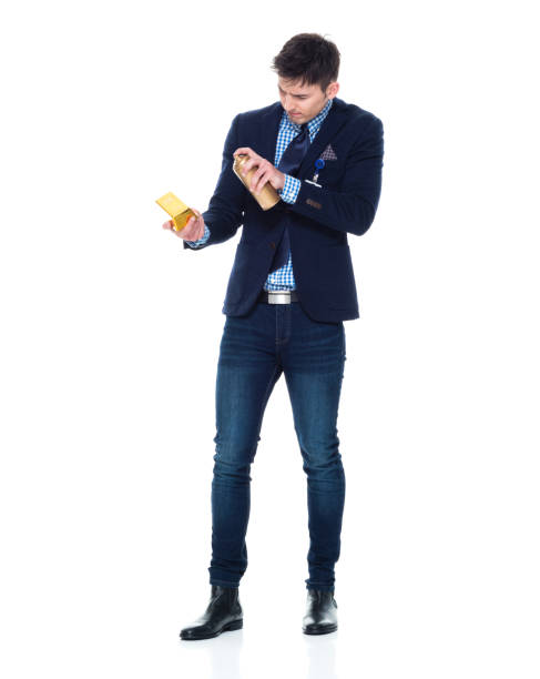 istock Businessman spraying gold bars 950189602