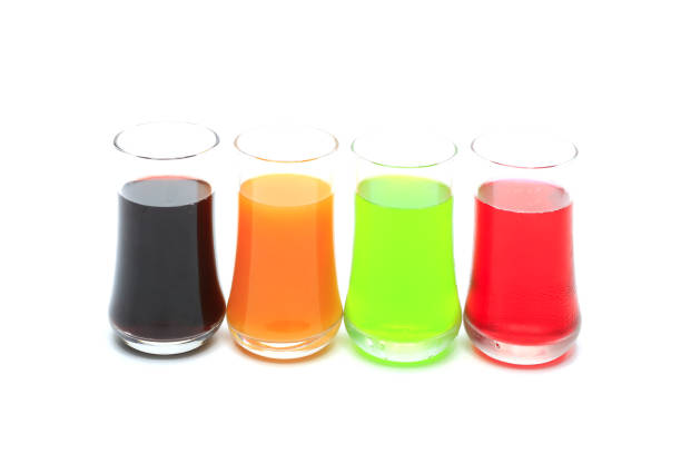 istock orange , apple , grape and strawberry juice in glass on white background 950197004