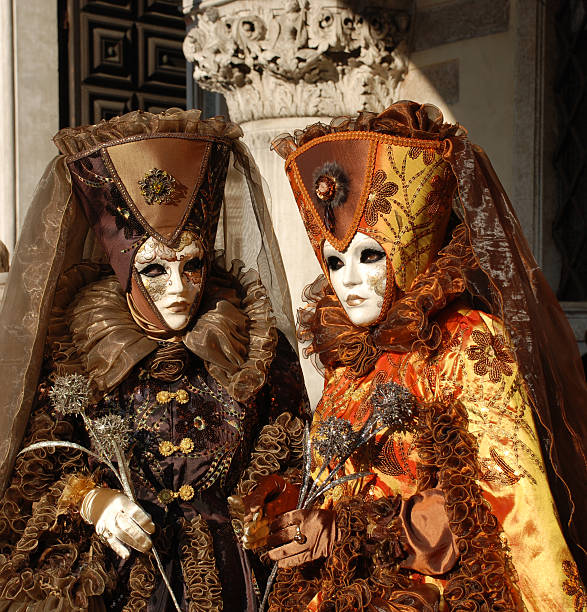 istock Women in Brown and Orange Costumes 95019848
