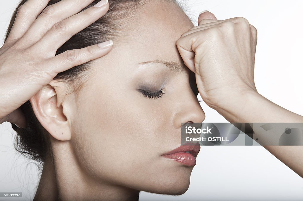 asian woman expression headache pain sadness depression confusion  Adult Stock Photo