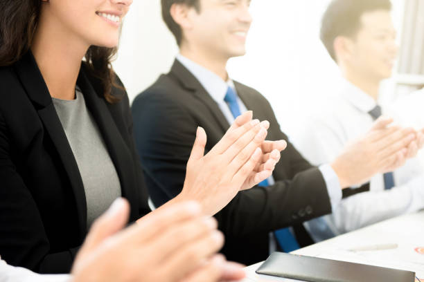 istock Business people  clapping their hands at the meeting 950201090